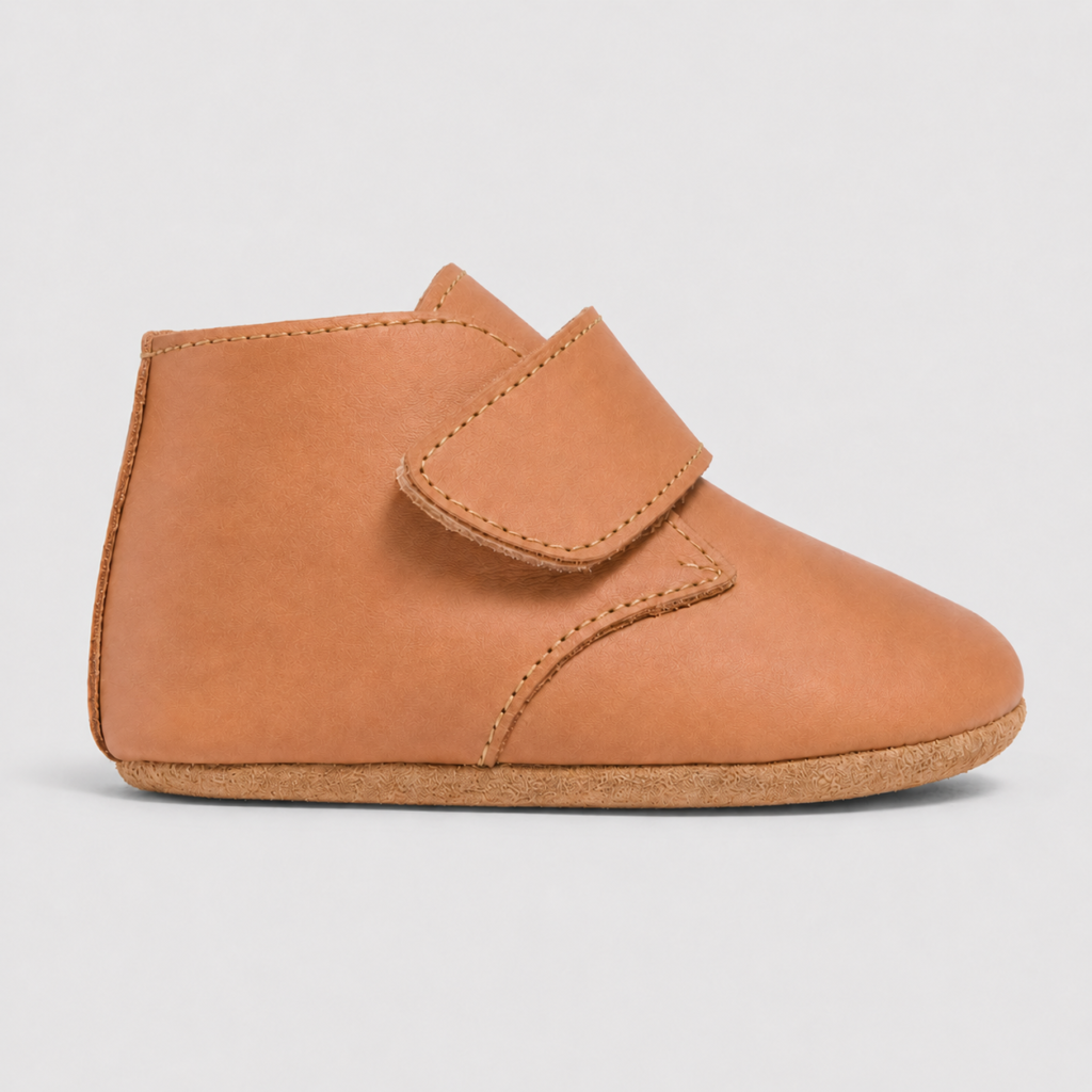Tan leather baby ankle bootie with hook-and-loop closure